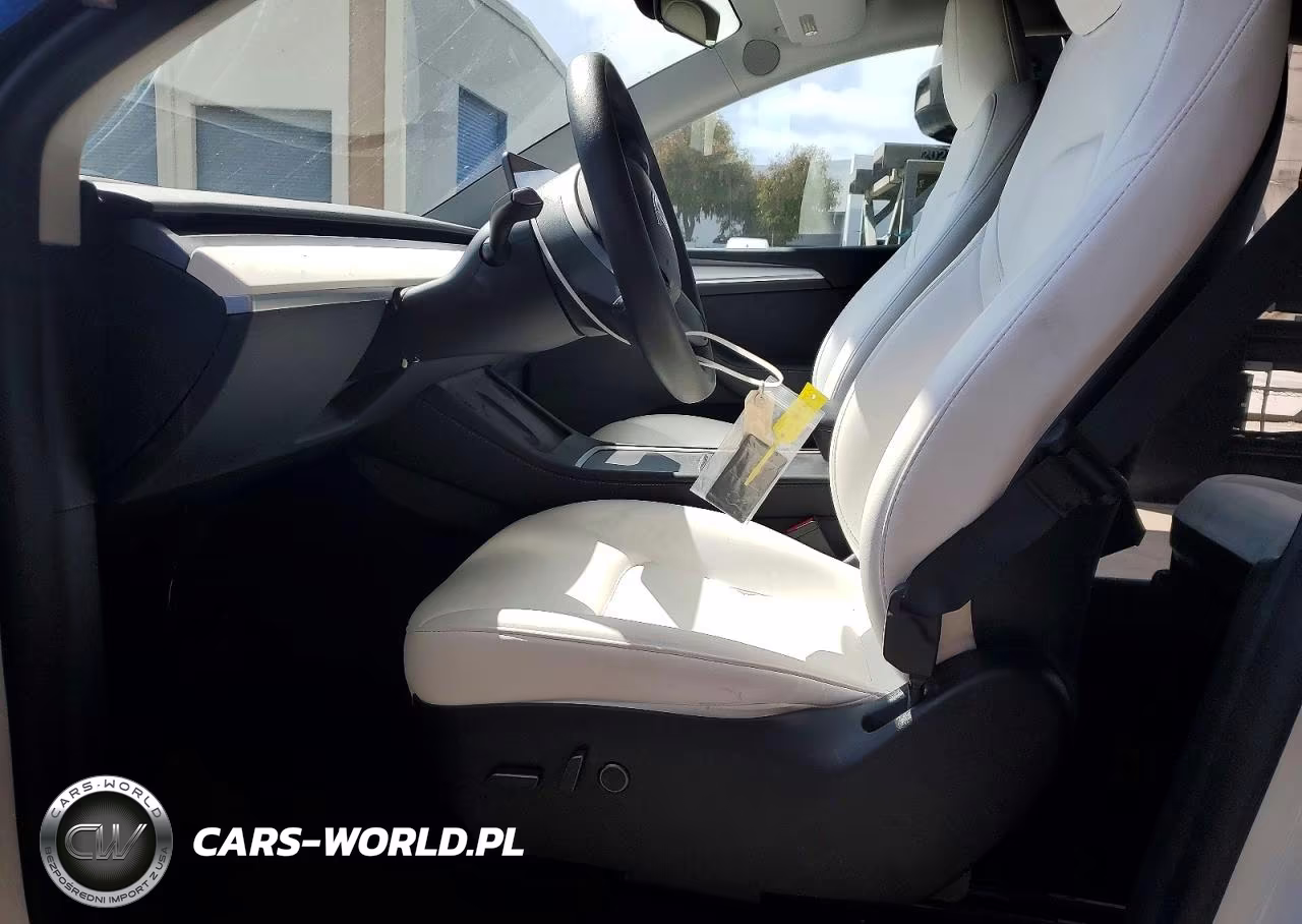 2023 Tesla Model Y VIN:7SAYGAEE8PF933507 - 7