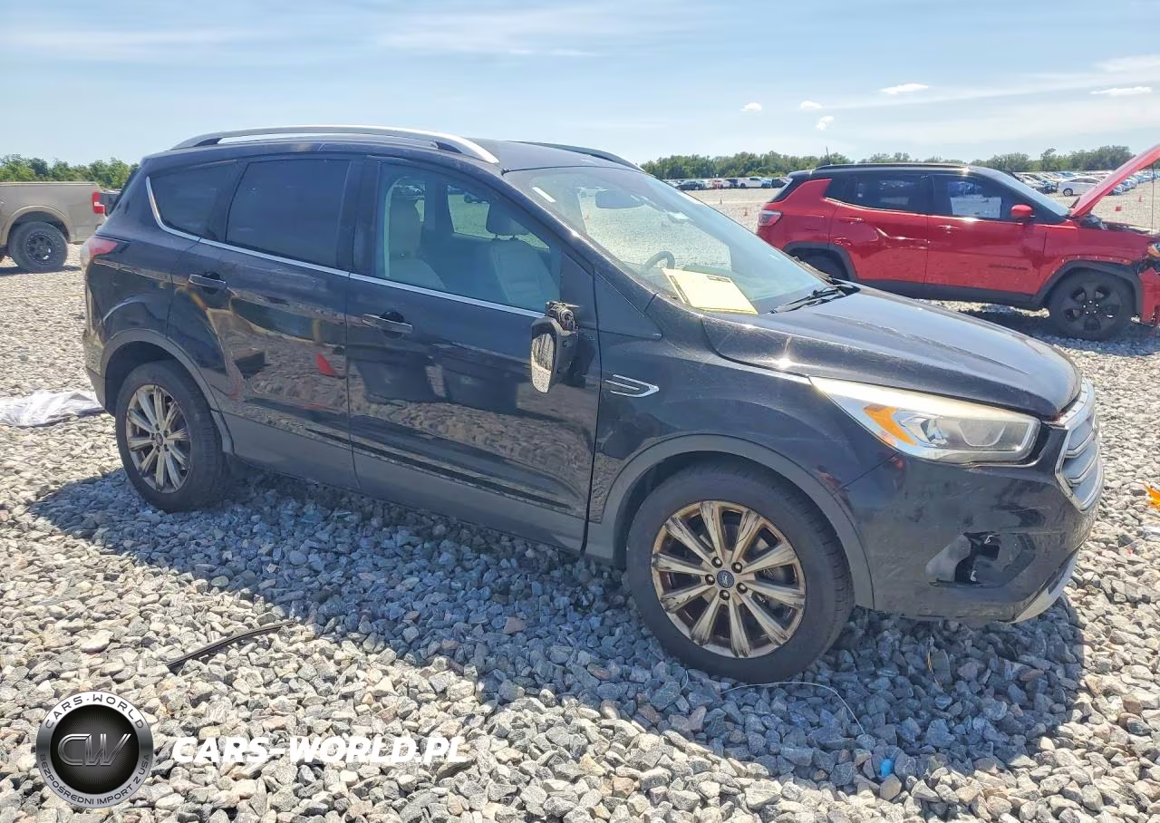 2017 Ford Escape Titanium VIN:1FMCU0JD8HUE02075 - 4