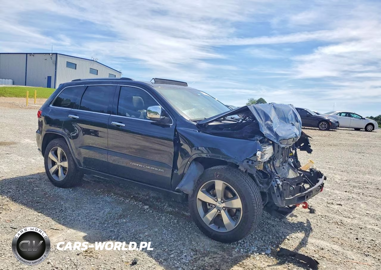 2015 Jeep Grand Cherokee Overland VIN:1C4RJECG3FC856930 - 4