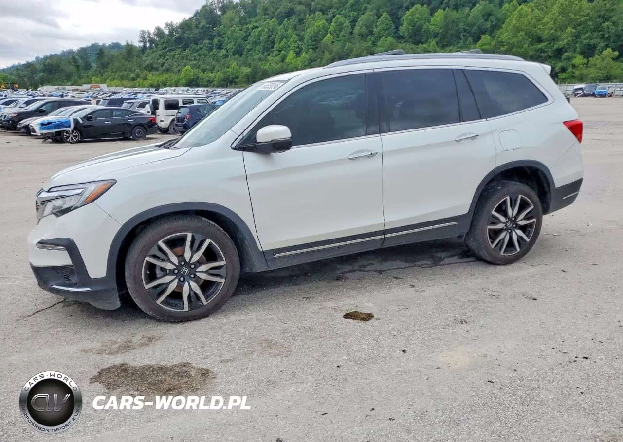 2022 Honda Pilot Touring VIN:5FNYF6H96NB016090 - 1