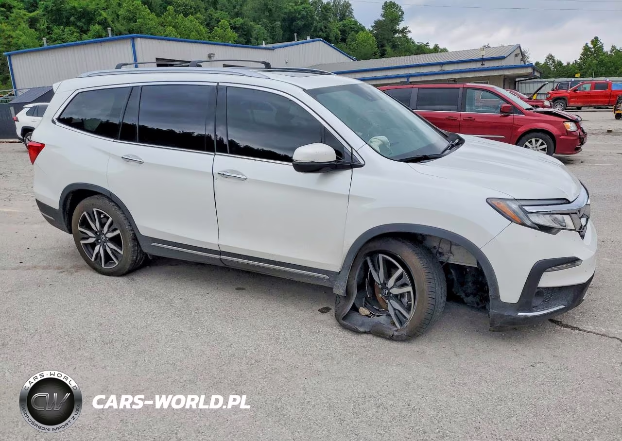 2022 Honda Pilot Touring VIN:5FNYF6H96NB016090 - 4