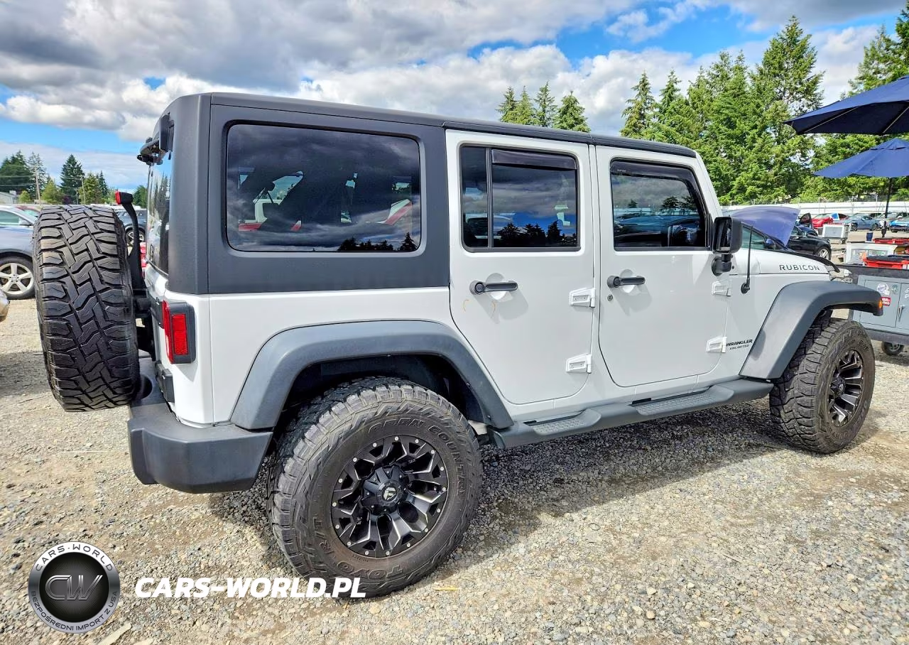 2014 Jeep Wrangler Unlimited Rubicon VIN:1C4BJWFG1EL116049 - 3