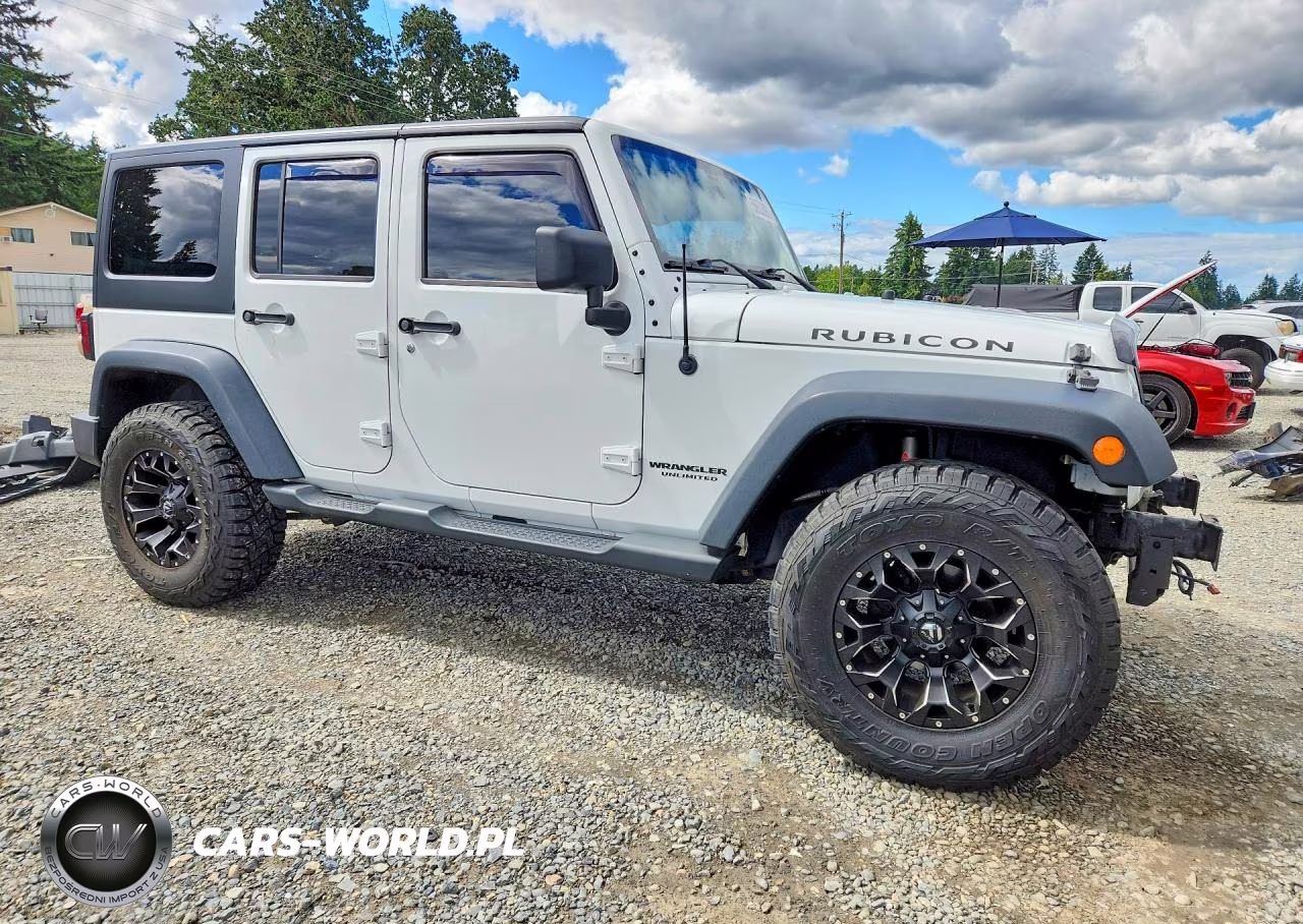 2014 Jeep Wrangler Unlimited Rubicon VIN:1C4BJWFG1EL116049 - 4