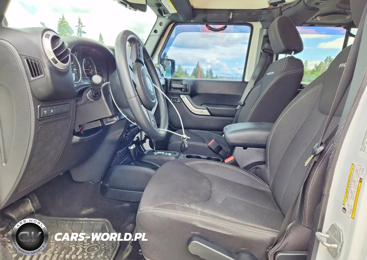 2014 Jeep Wrangler Unlimited Rubicon VIN:1C4BJWFG1EL116049 - 7