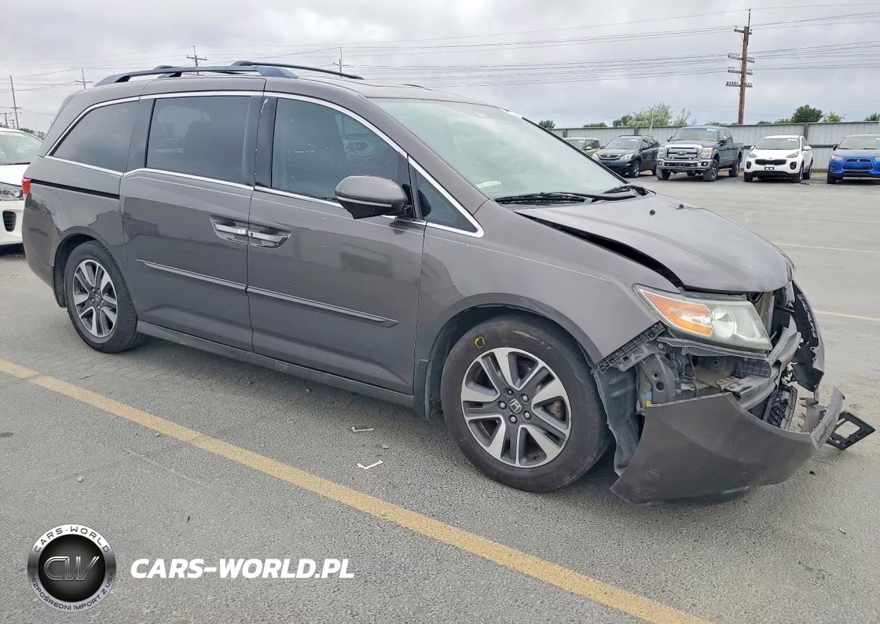 2014 Honda Odyssey Touring VIN:5FNRL5H9XEB005908 - 4