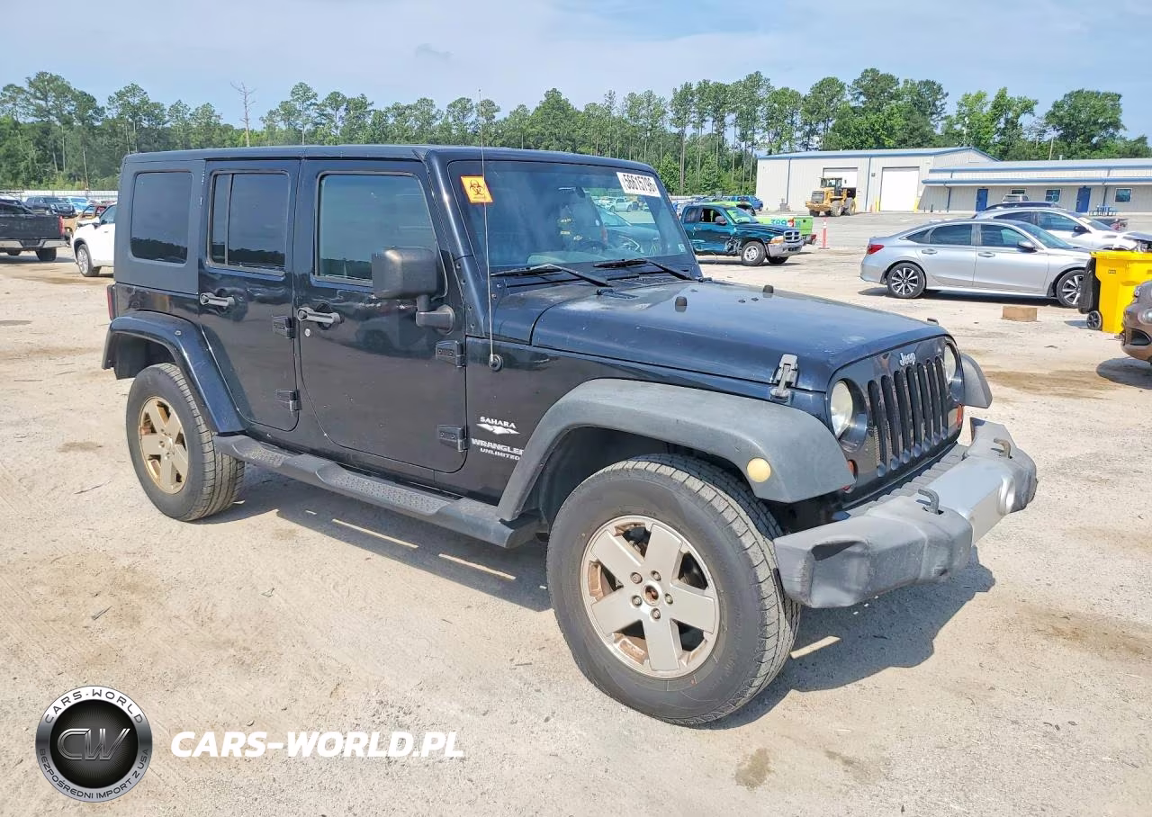 2010 Jeep Wrangler Unlimited Sahara VIN:1J4HA5H15AL226667 - 4