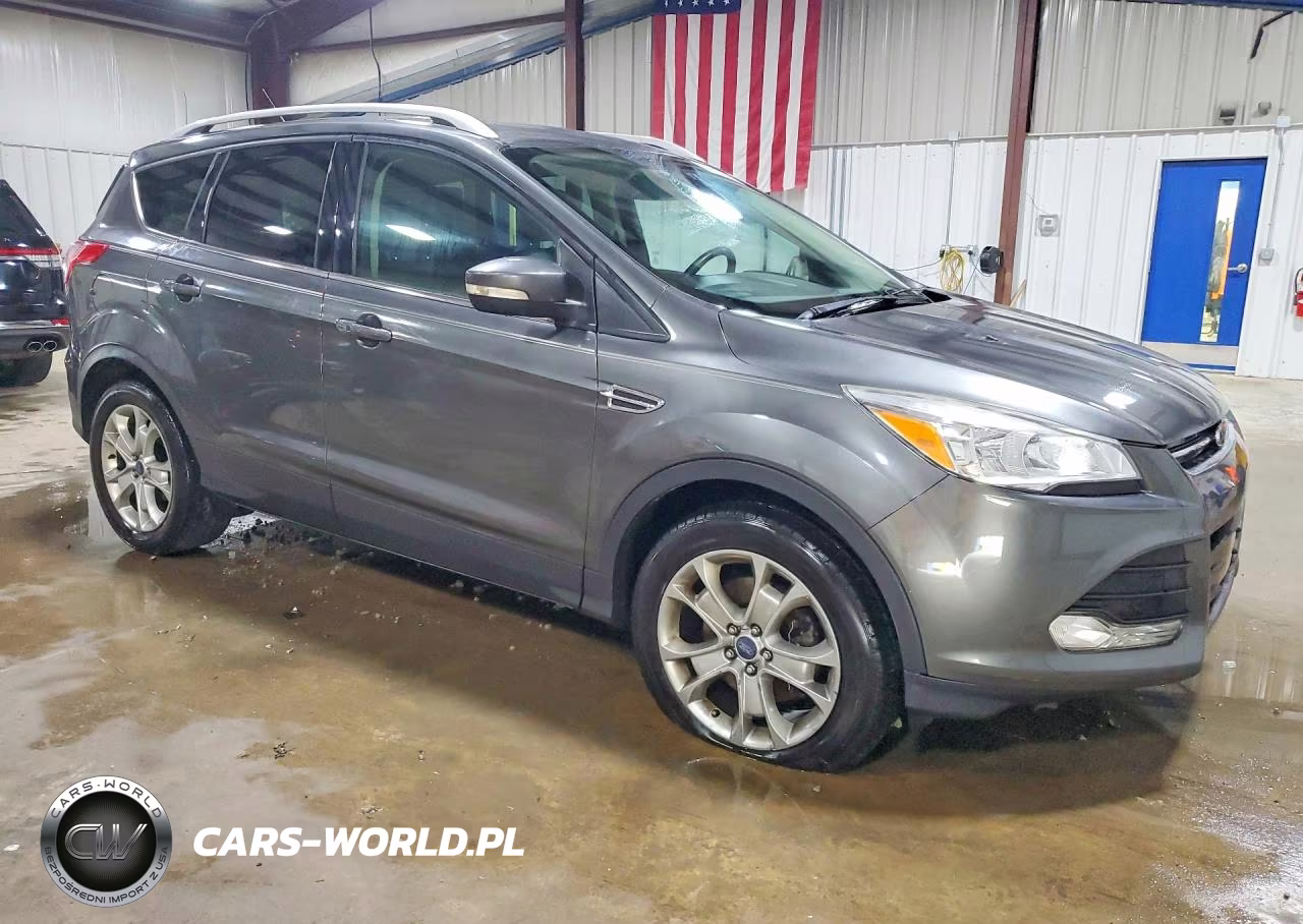 2016 Ford Escape Titanium VIN:1FMCU9J94GUA50997 - 4