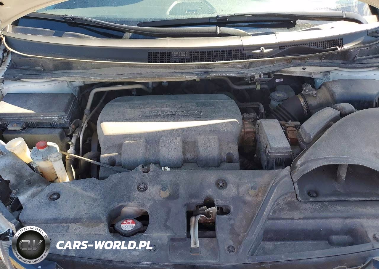 2015 Honda Odyssey Touring VIN:5FNRL5H91FB124819 - 12