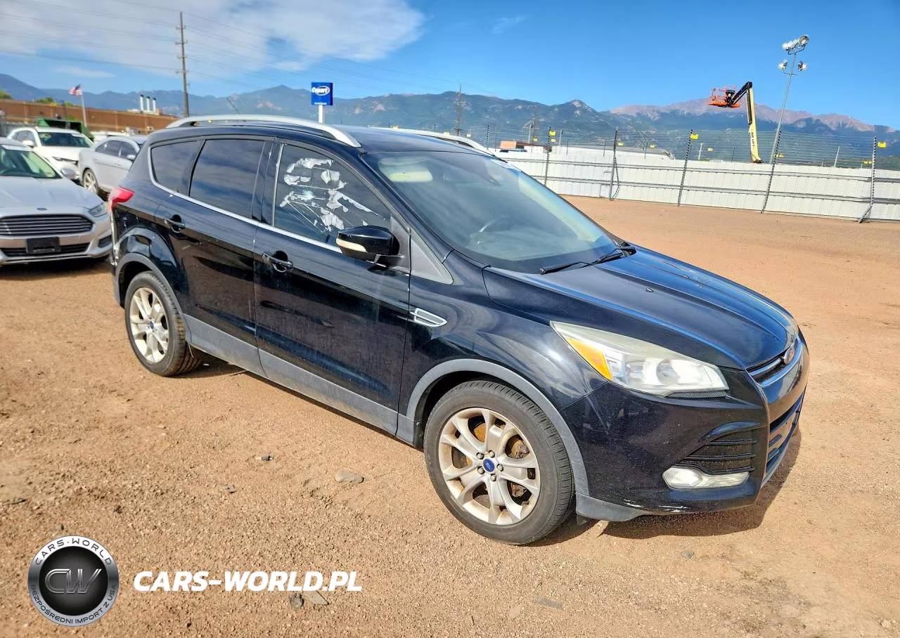 2016 Ford Escape Titanium VIN:1FMCU9J95GUB65561 - 4