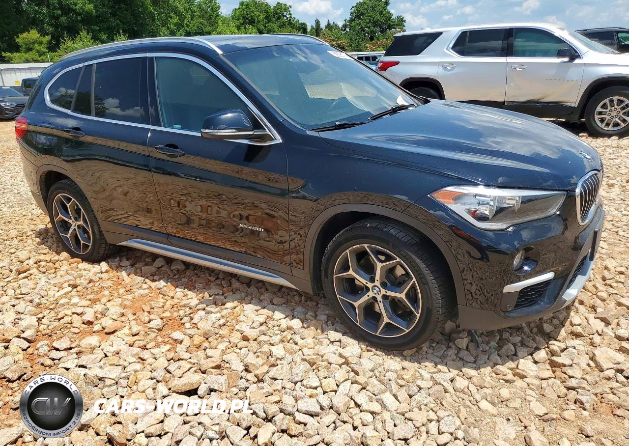 2018 BMW X1 xDrive28I VIN:WBXHT3Z30J4A66556 - 4