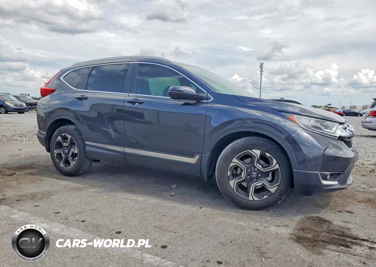 2019 Honda Cr-V Touring VIN:5J6RW1H97KL003911 - 4