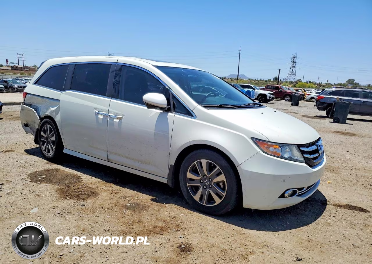 2017 Honda Odyssey Touring VIN:5FNRL5H98HB000694 - 4