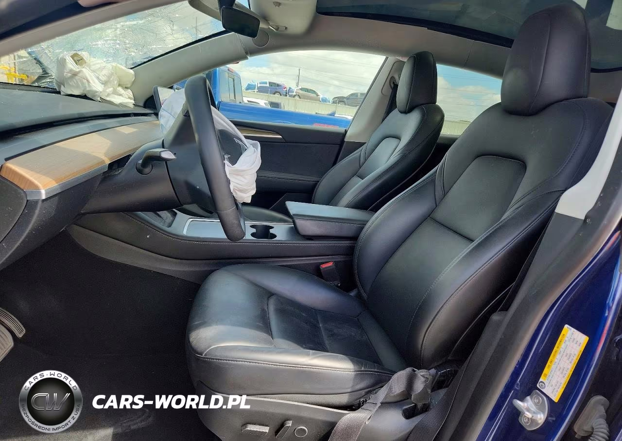 2023 Tesla Model Y VIN:7SAYGDEE7PA063943 - 7