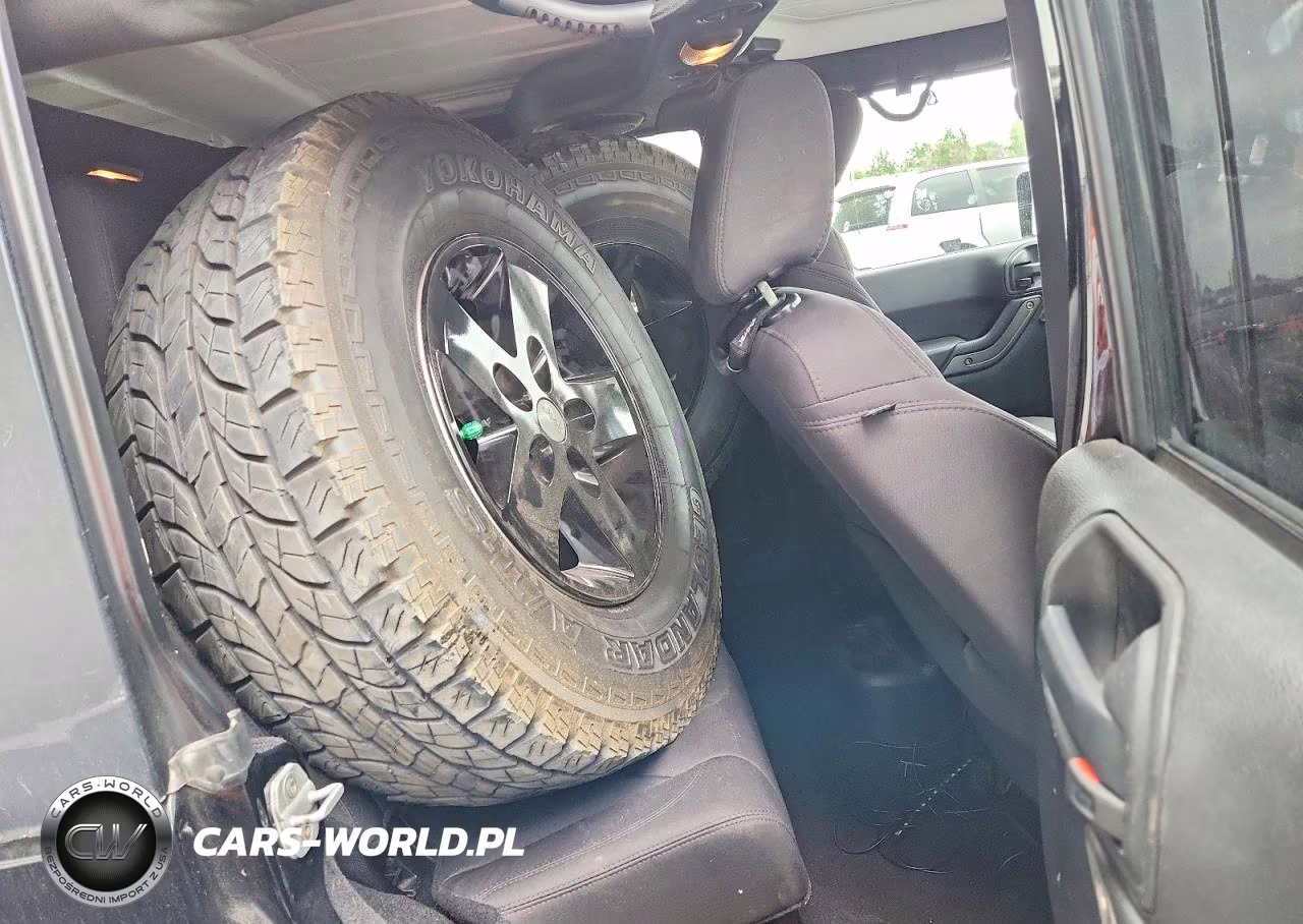 2013 Jeep Wrangler Unlimited Sport VIN:1C4HJWDG1DL594144 - 11