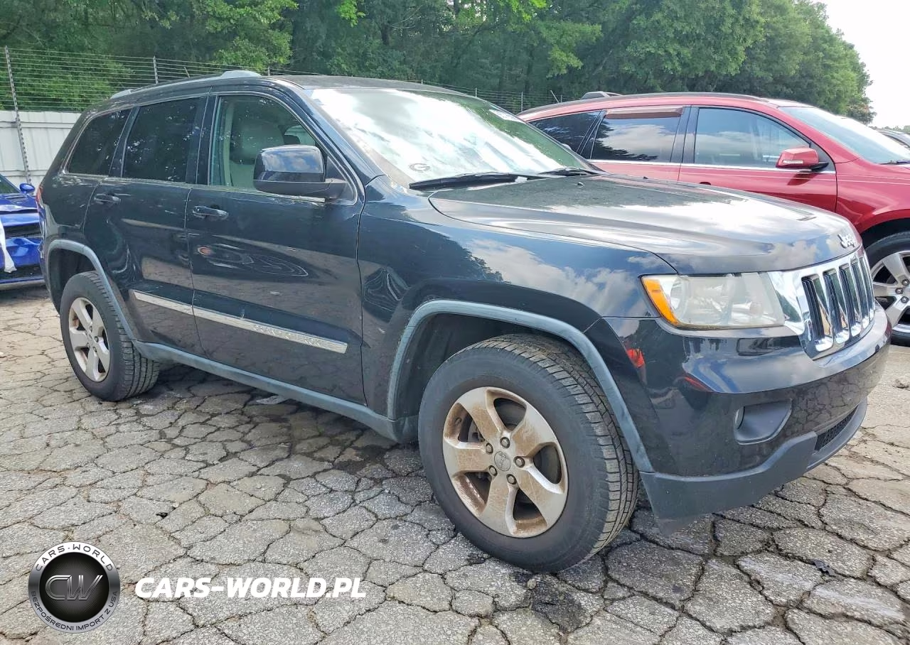 2011 Jeep Grand Cherokee Laredo VIN:1J4RS4GG7BC704283 - 4
