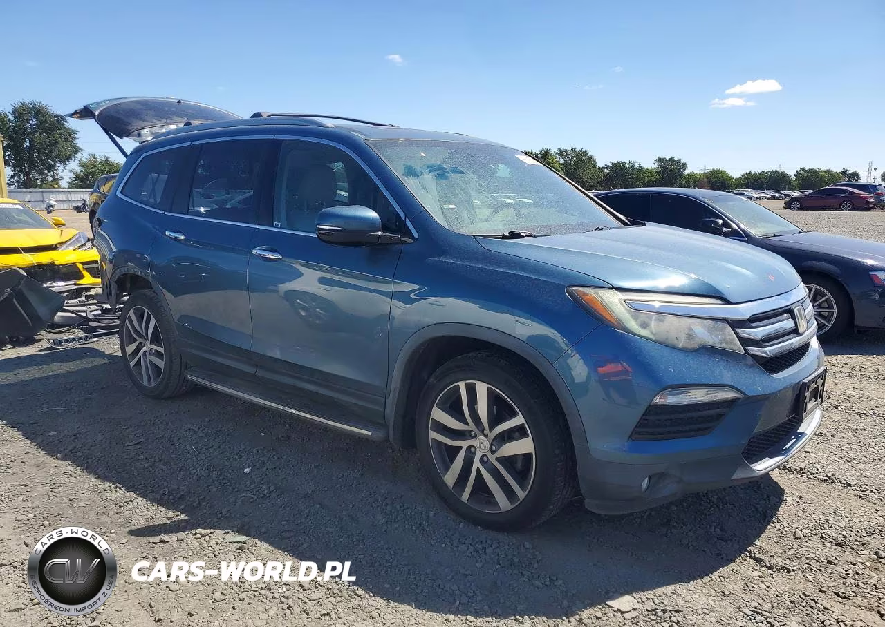 2017 Honda Pilot Elite VIN:5FNYF6H01HB079863 - 4
