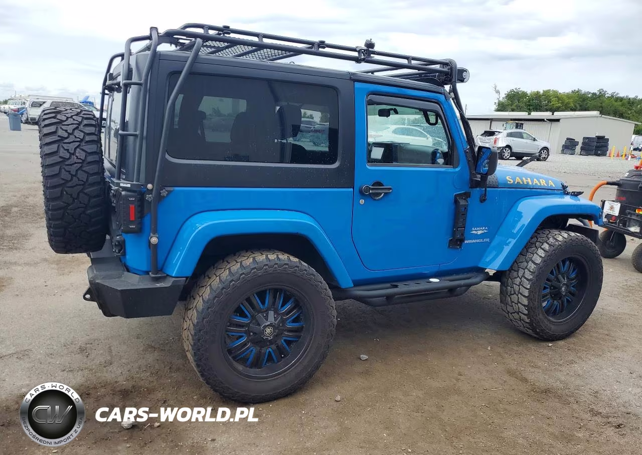 2011 Jeep Wrangler Sahara VIN:1J4AA5D19BL565988 - 3