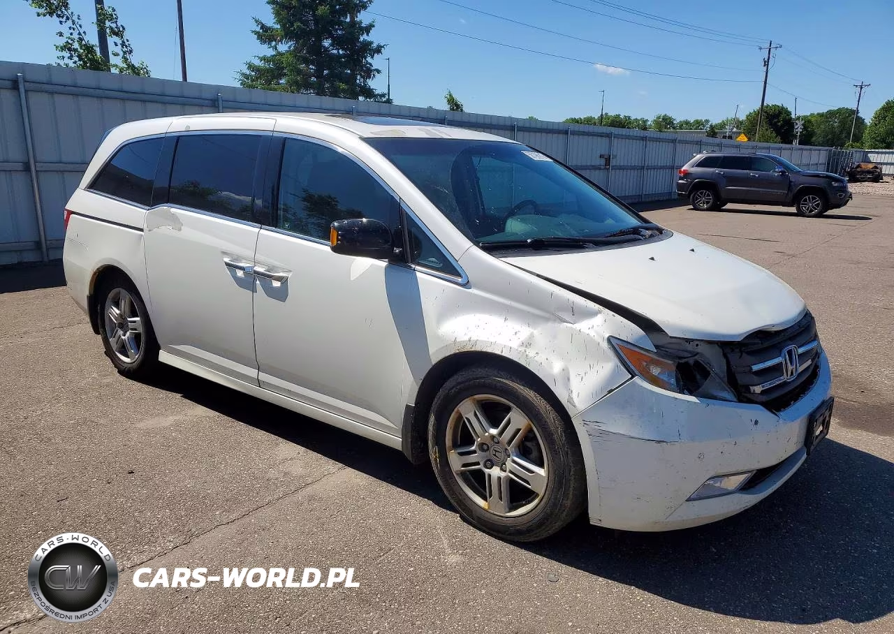 2012 Honda Odyssey Touring VIN:5FNRL5H93CB143285 - 4