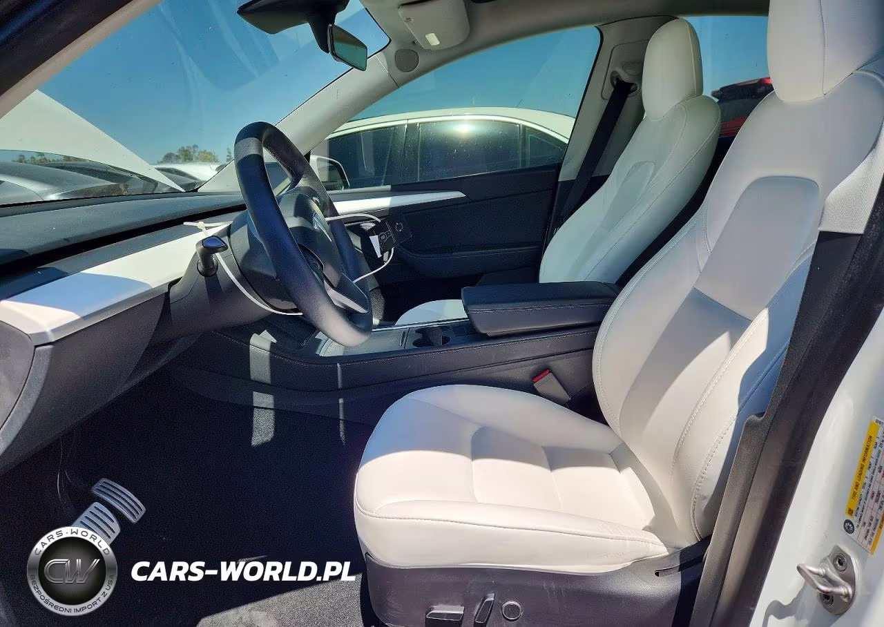 2023 Tesla Model Y VIN:7SAYGDEFXPF631677 - 7