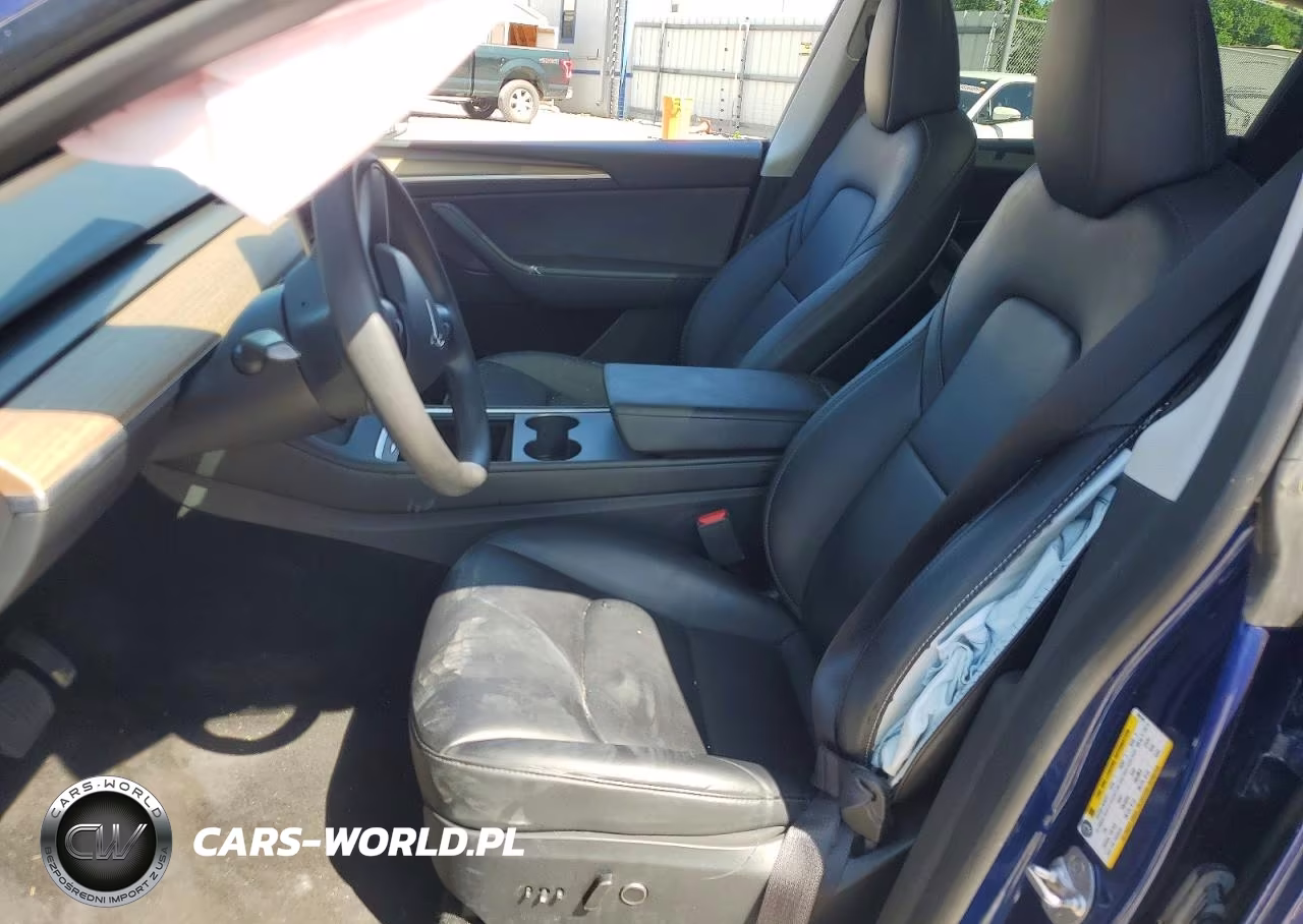 2023 Tesla Model Y VIN:7SAYGAEE9PF769748 - 7