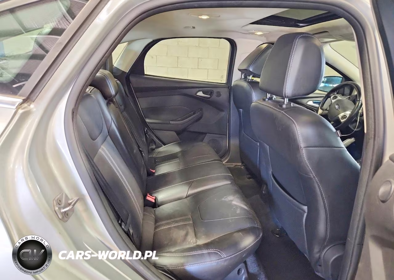 2014 Ford Focus Titanium VIN:1FADP3J20EL115627 - 10