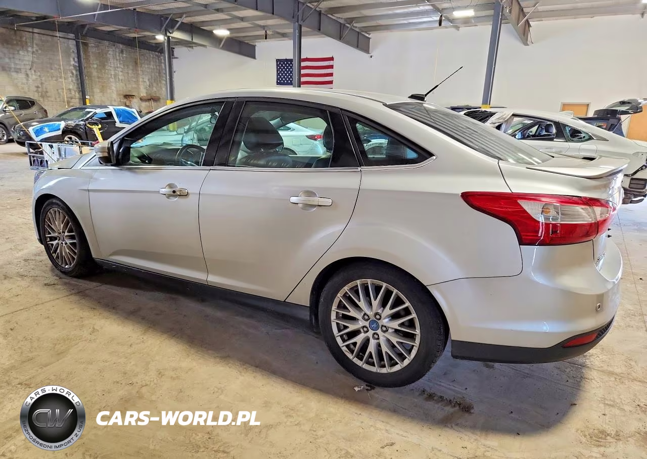 2014 Ford Focus Titanium VIN:1FADP3J20EL115627 - 2