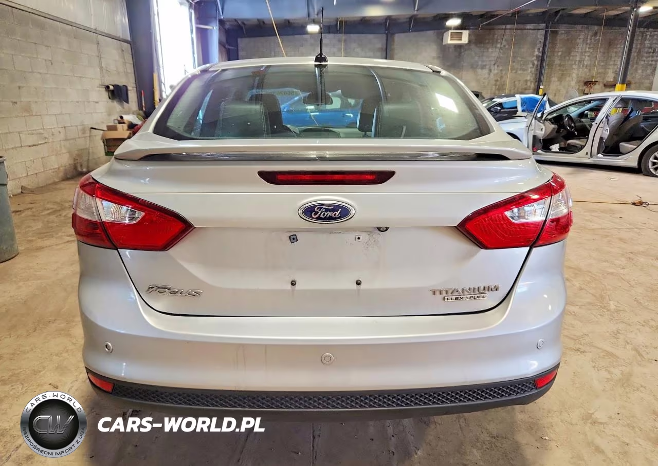 2014 Ford Focus Titanium VIN:1FADP3J20EL115627 - 6