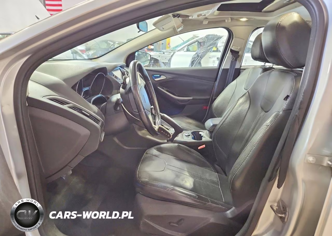 2014 Ford Focus Titanium VIN:1FADP3J20EL115627 - 7