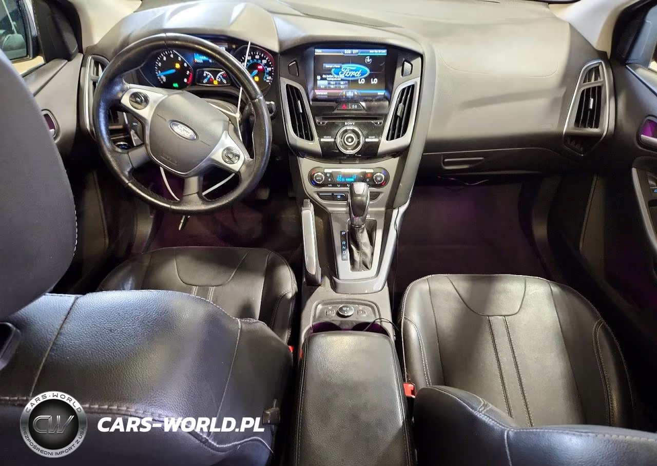 2014 Ford Focus Titanium VIN:1FADP3J20EL115627 - 8
