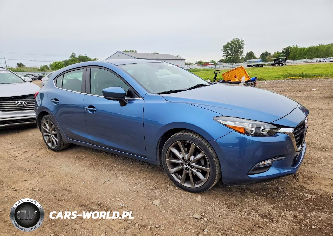 2018 Mazda 3 Touring VIN:3MZBN1L35JM254840 - 4