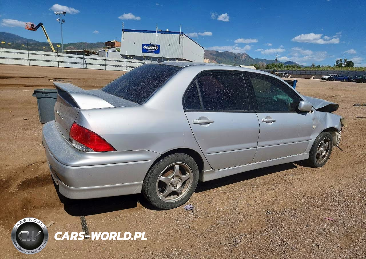 2002 Mitsubishi Lancer Oz Rally VIN:JA3AJ86E72U063593 - 3