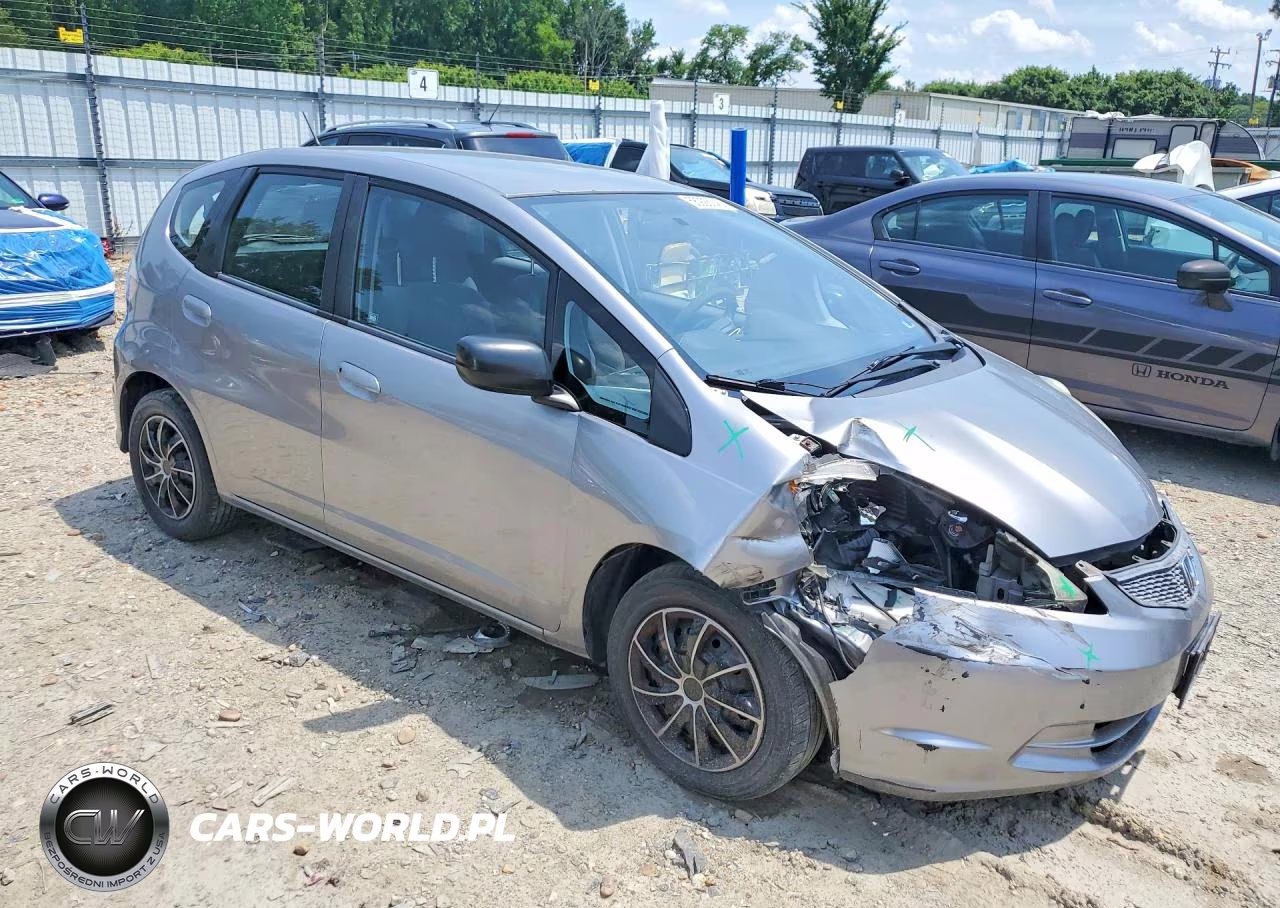 2009 Honda Fit VIN:JHMGE882X9S006568 - 4