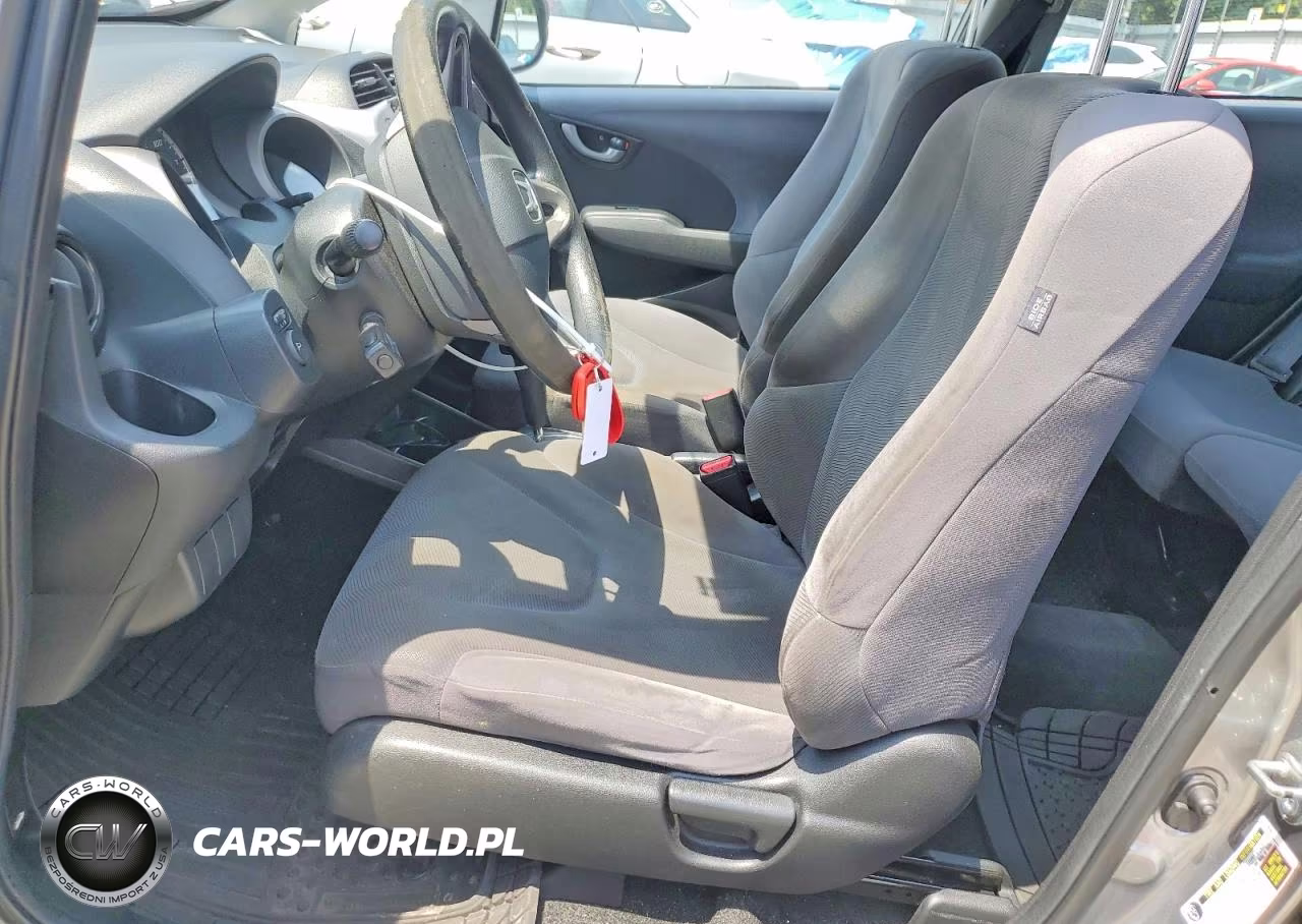 2009 Honda Fit VIN:JHMGE882X9S006568 - 7