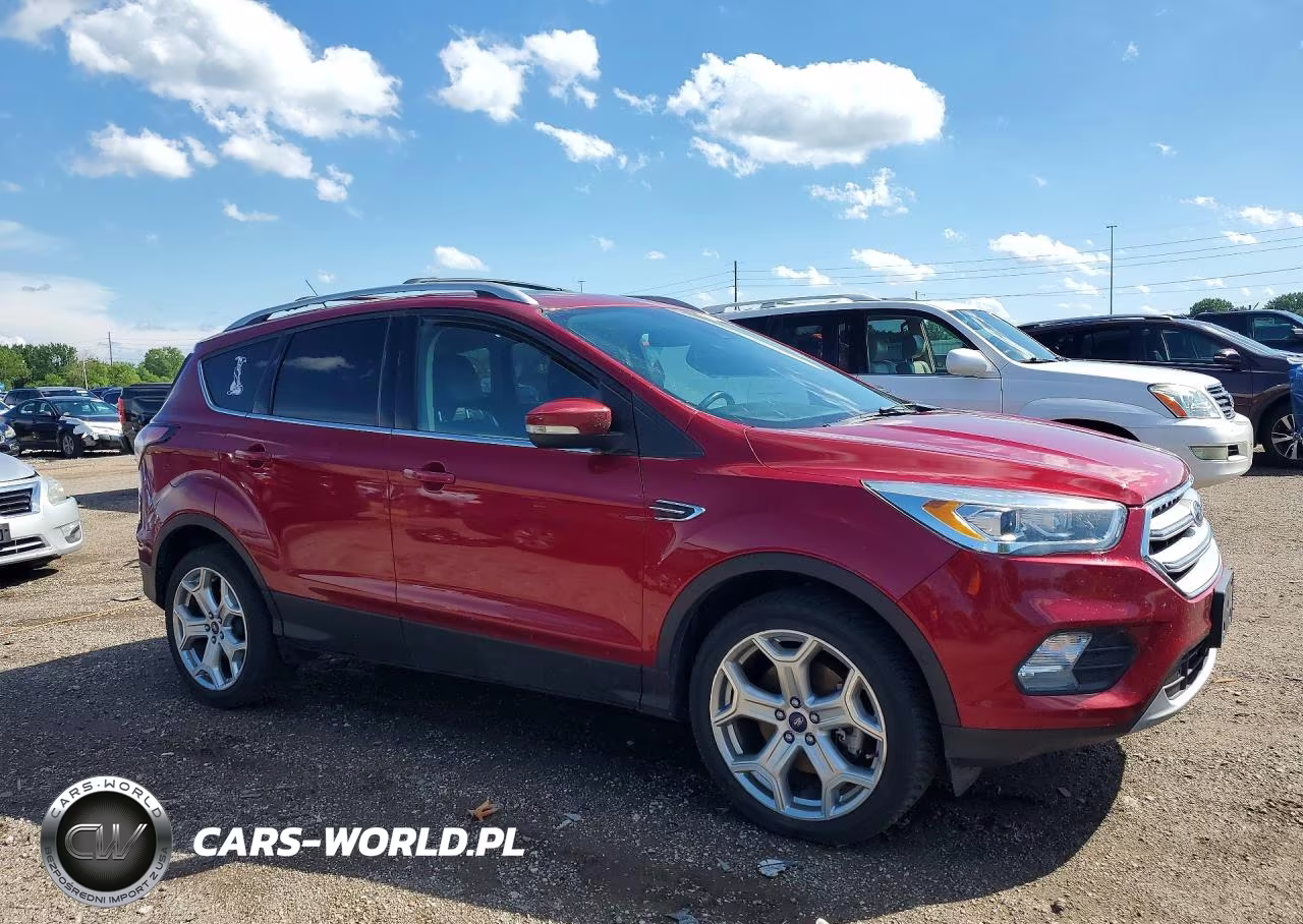 2017 Ford Escape Titanium VIN:1FMCU9J99HUC00989 - 4