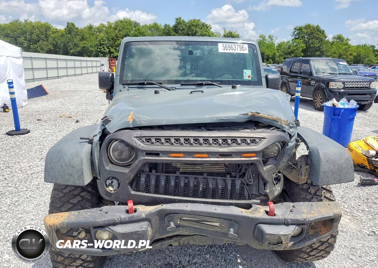 2014 Jeep Wrangler Unlimited Rubicon VIN:1C4HJWFG7EL166335 - 5