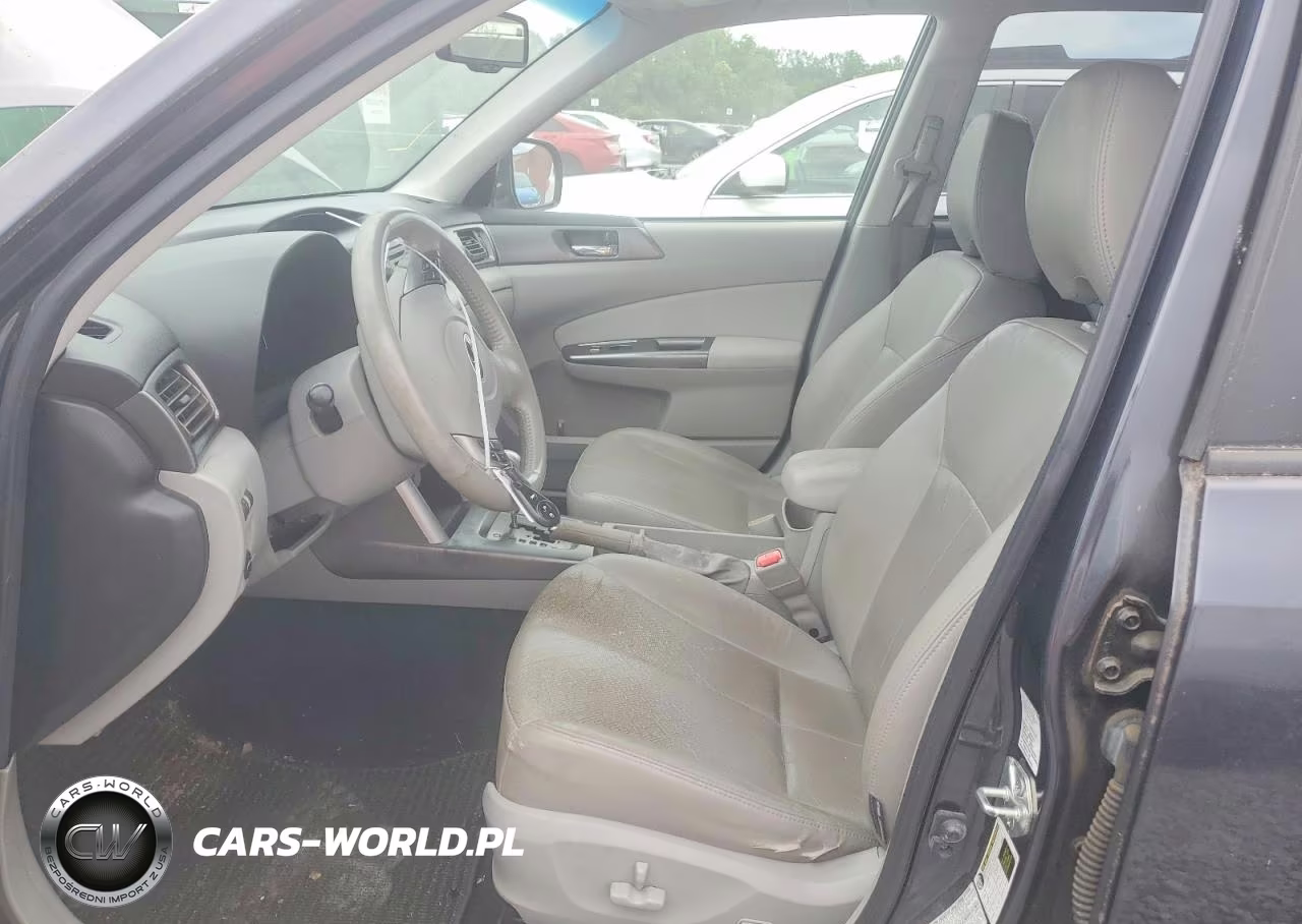 2011 Subaru Forester Touring VIN:JF2SHAGC4BH724674 - 7