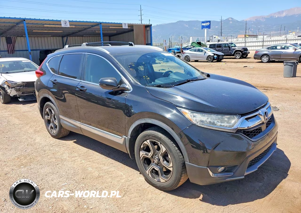 2017 Honda Cr-V Touring VIN:2HKRW2H91HH677982 - 4