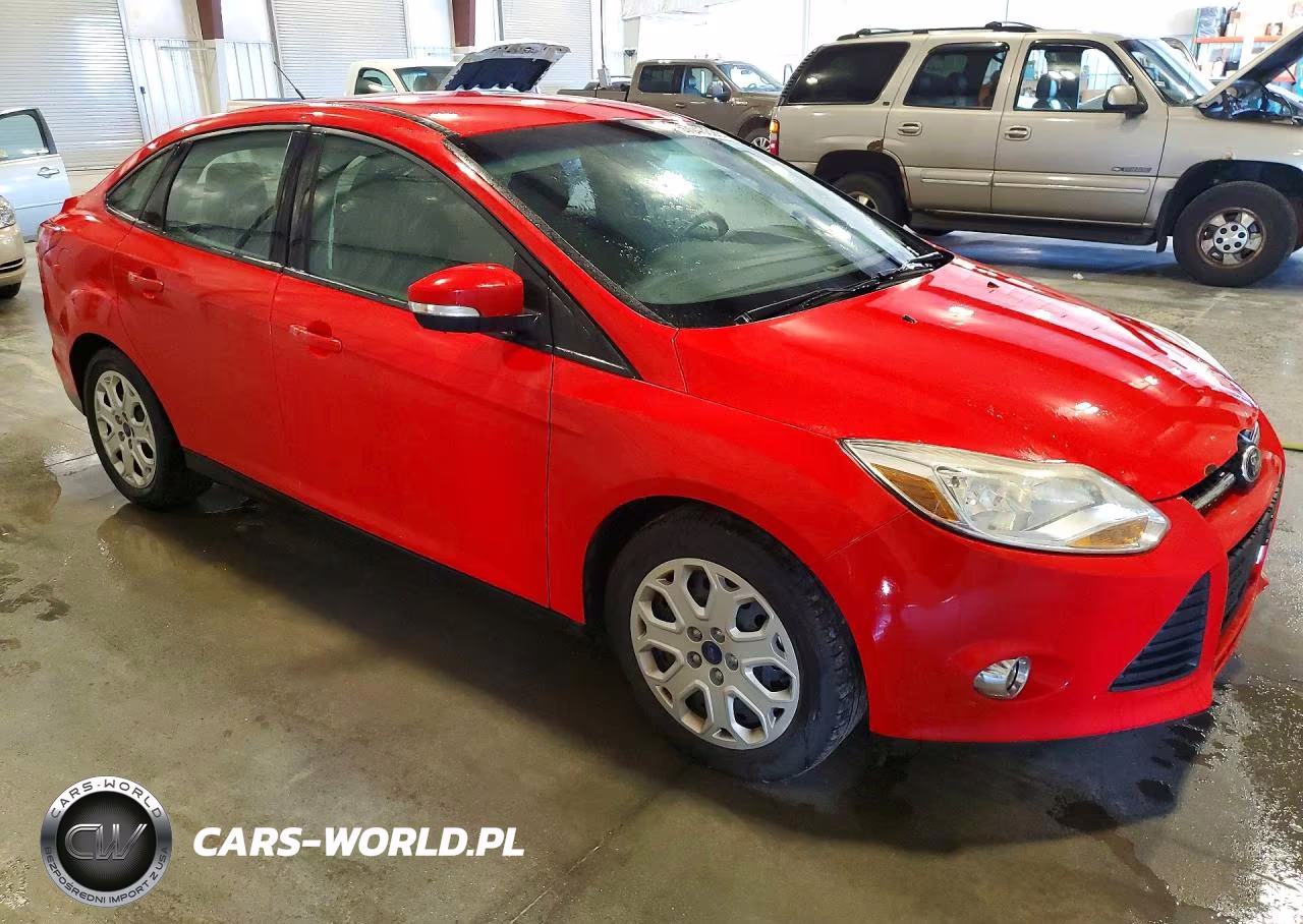 2012 Ford Focus 4D VIN:1FAHP3F27CL477106 - 4