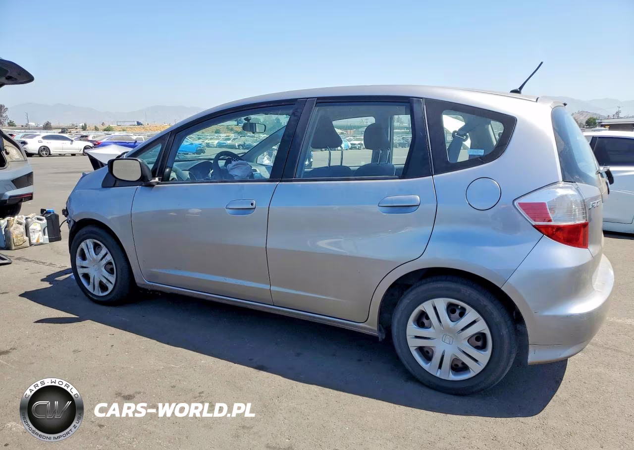 2009 Honda Fit VIN:JHMGE88269S070994 - 2