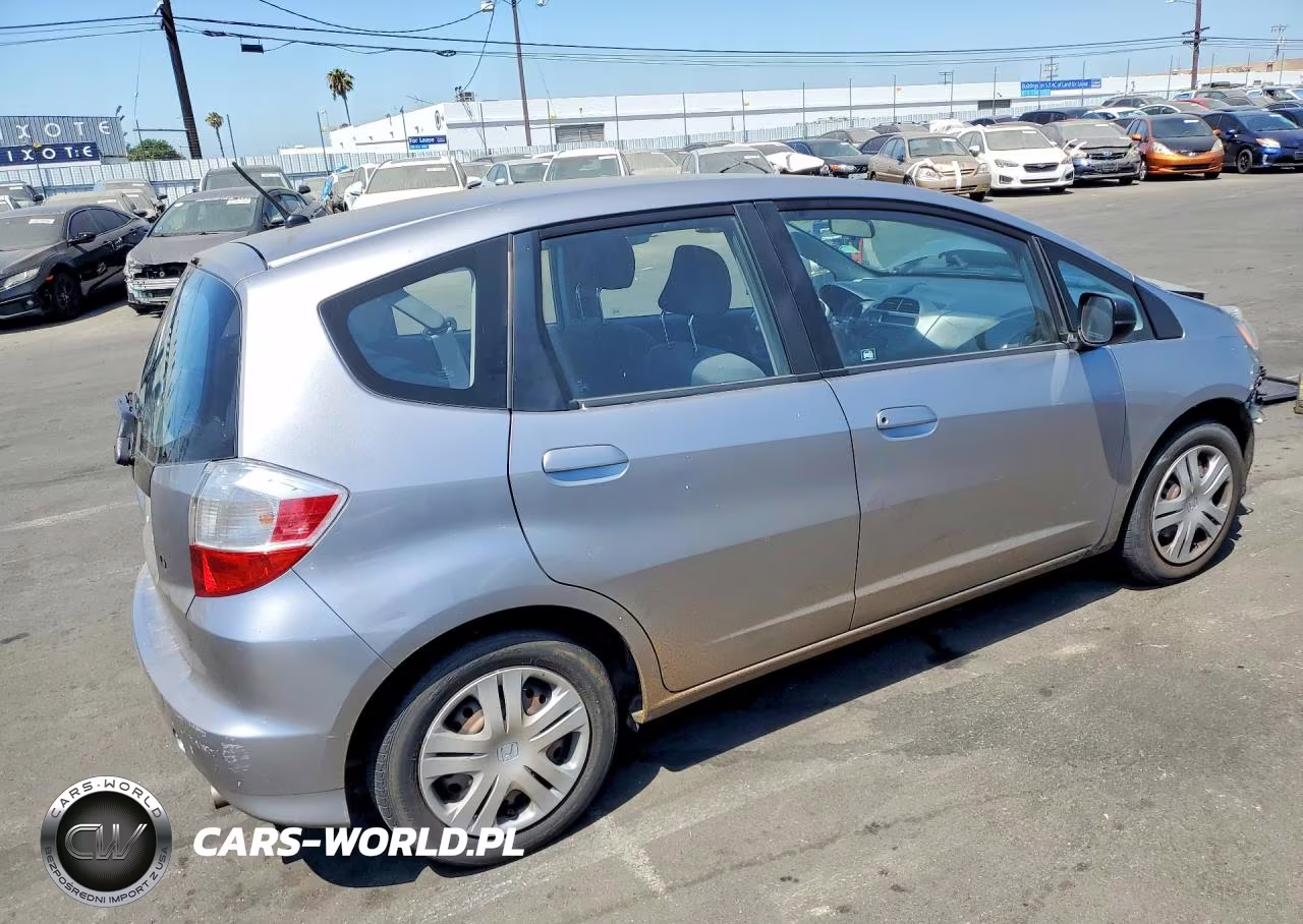 2009 Honda Fit VIN:JHMGE88269S070994 - 3