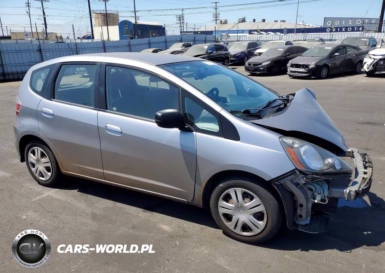 2009 Honda Fit VIN:JHMGE88269S070994 - 4