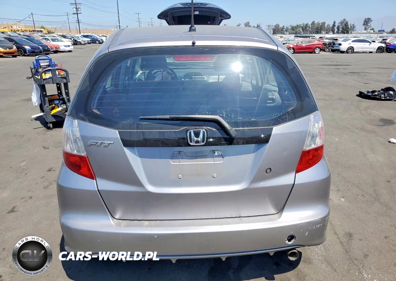 2009 Honda Fit VIN:JHMGE88269S070994 - 6