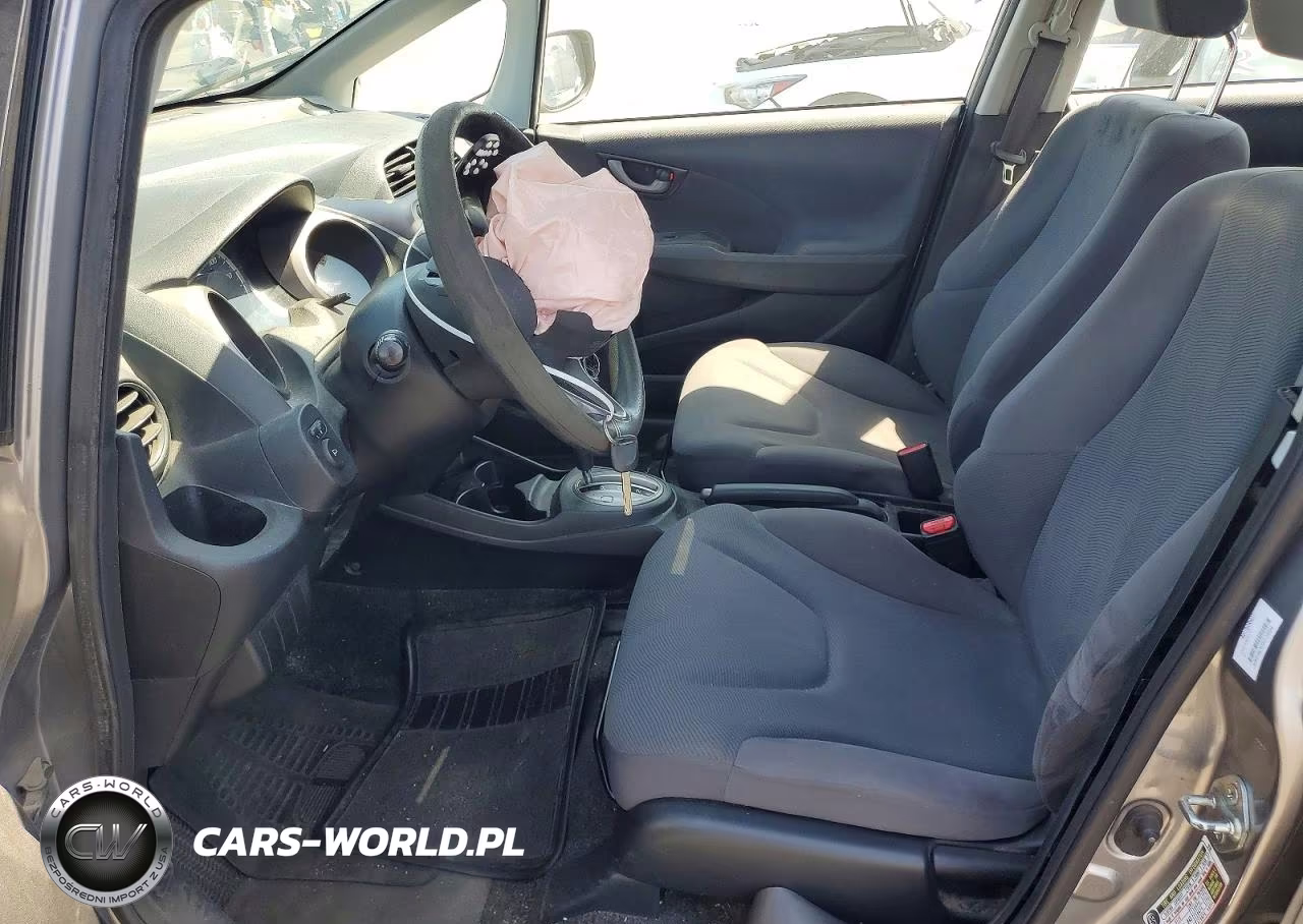 2009 Honda Fit VIN:JHMGE88269S070994 - 7