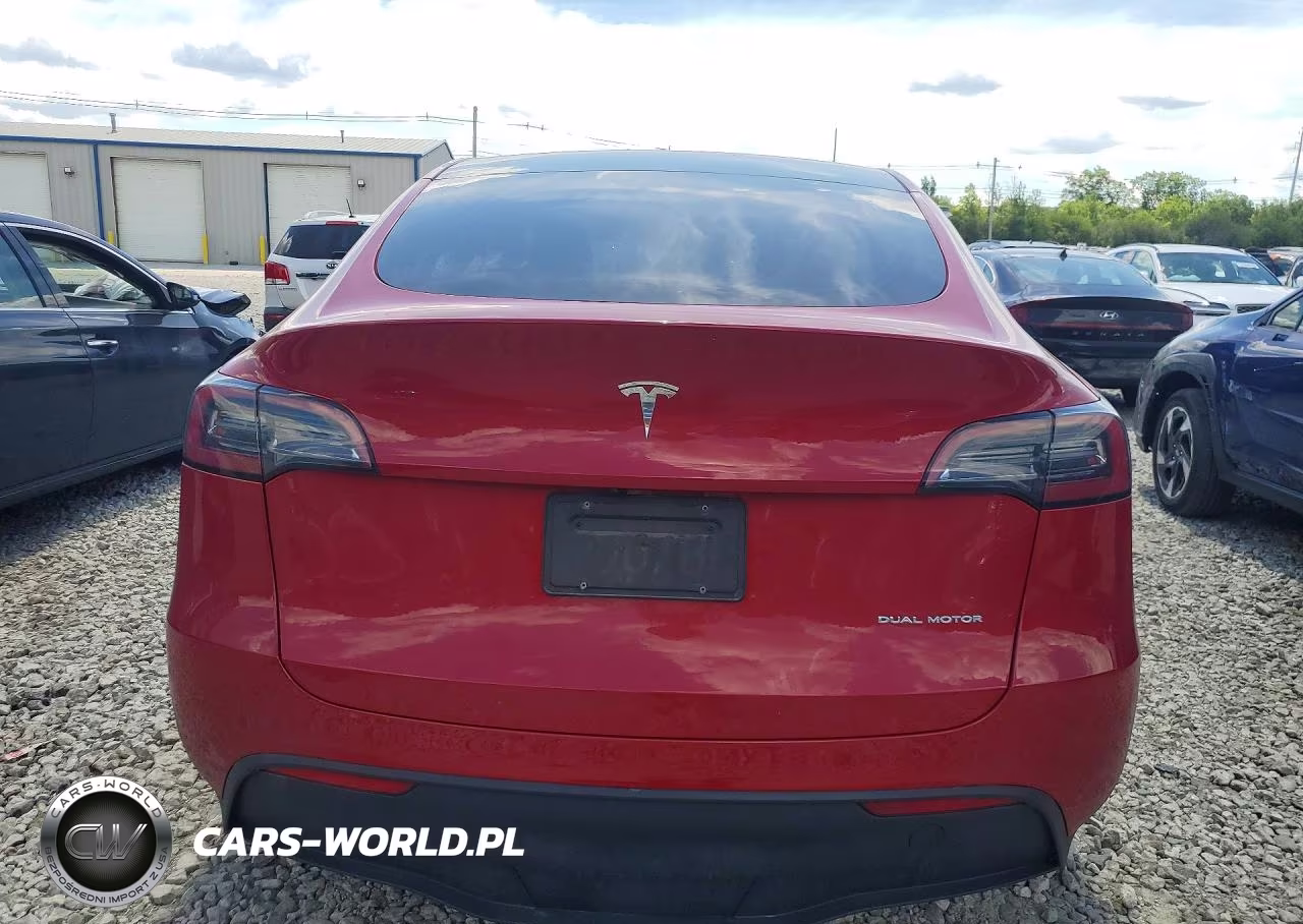 2023 Tesla Model Y VIN:7SAYGDEE9PA211705 - 6