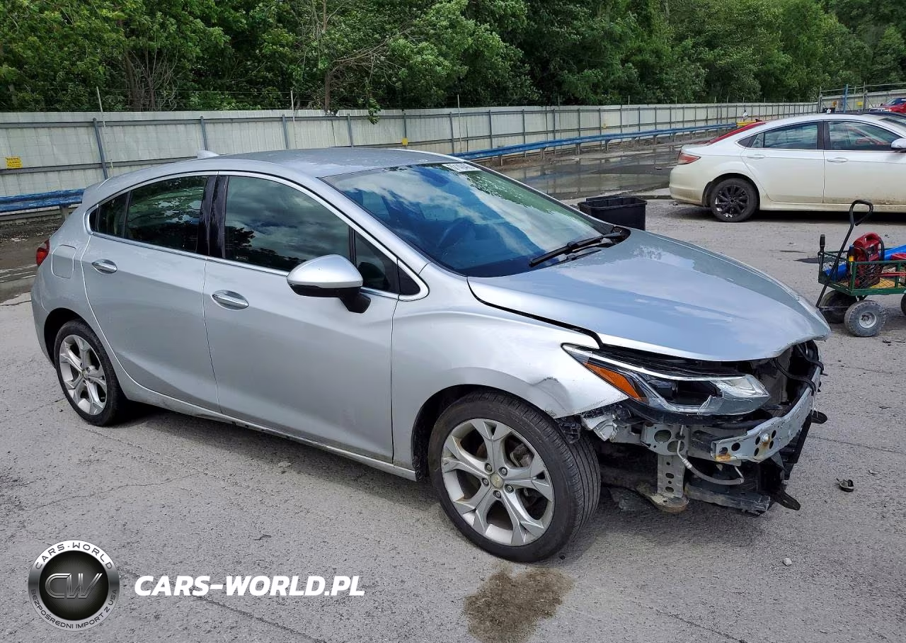 2018 Chevrolet Cruze Premier VIN:3G1BF6SM0JS628458 - 4