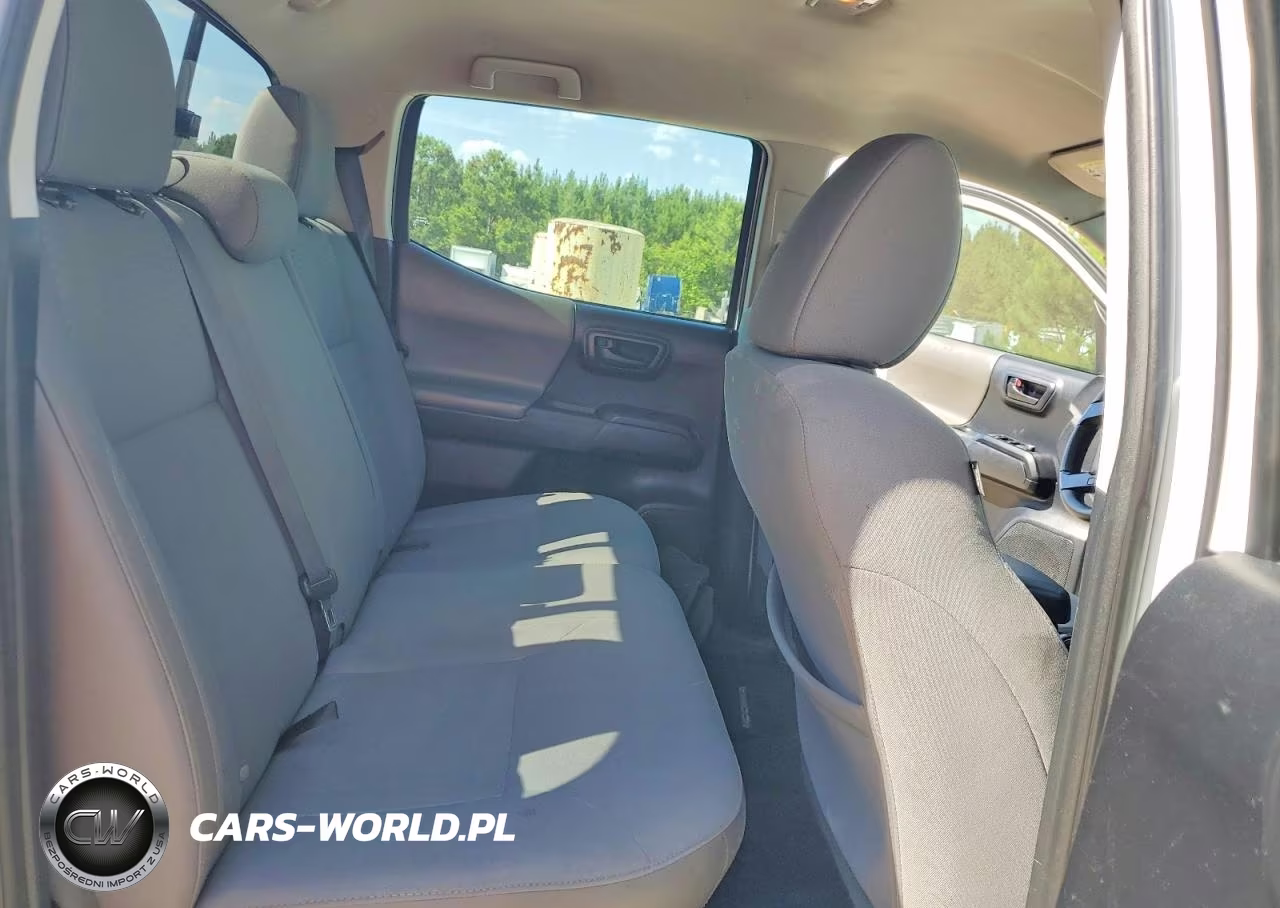 2018 Toyota Tacoma Sr VIN:5TFAX5GN5JX129357 - 10