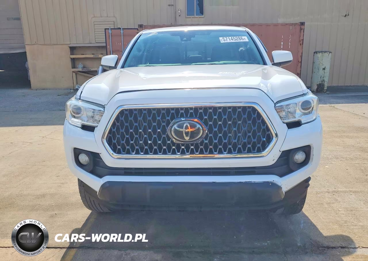 2018 Toyota Tacoma Sr VIN:5TFAX5GN5JX129357 - 5