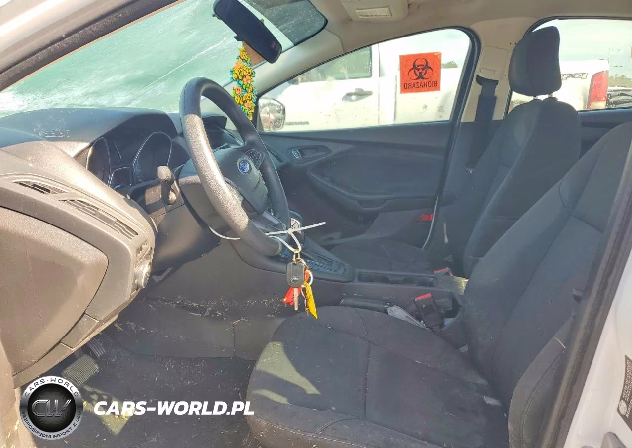 2016 Ford Focus S VIN:1FADP3E29GL294697 - 7