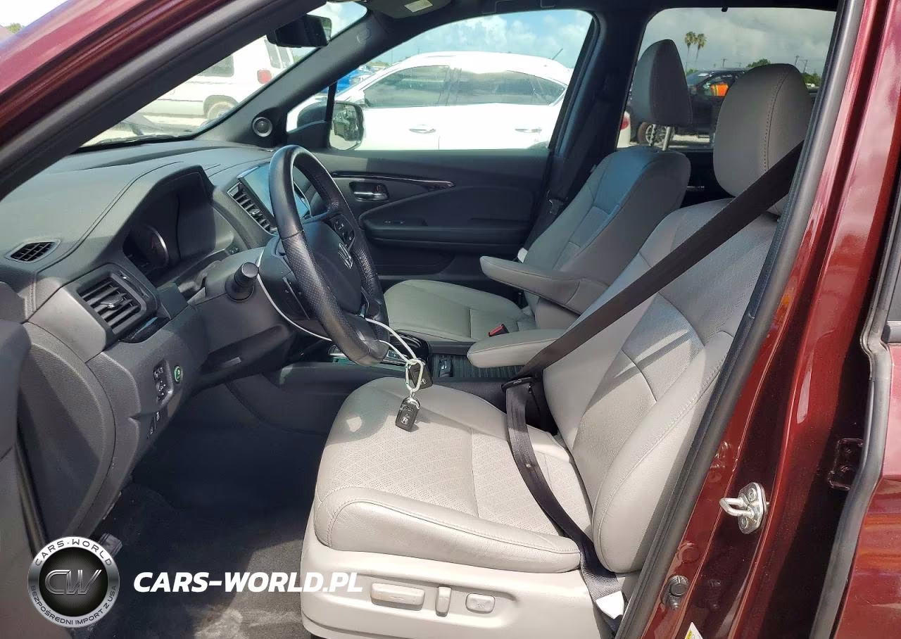 2020 Honda Passport Touring VIN:5FNYF7H99LB000825 - 7