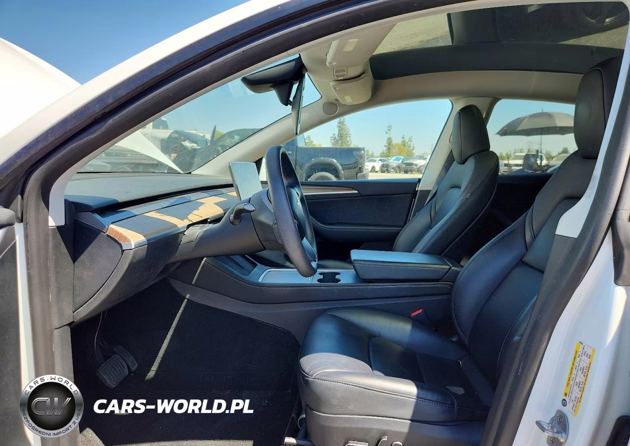 2023 Tesla Model Y VIN:7SAYGDEEXPF887034 - 7